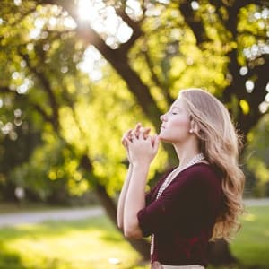 Woman meditating in park