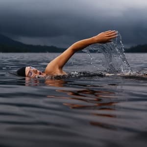 Woman swimming in lake