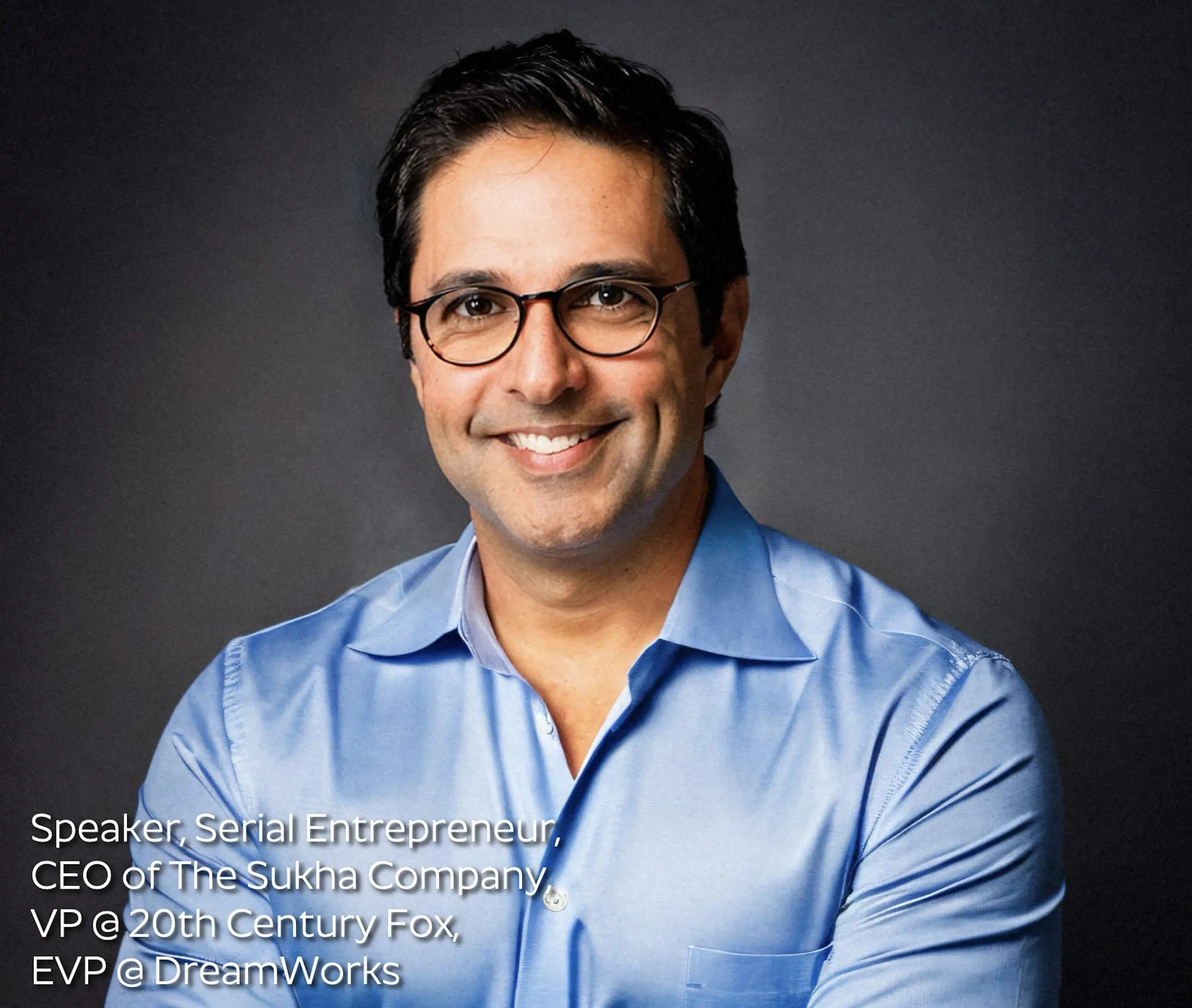 Steven Puri, remote work speaker and productivity expert, professional headshot in blue shirt